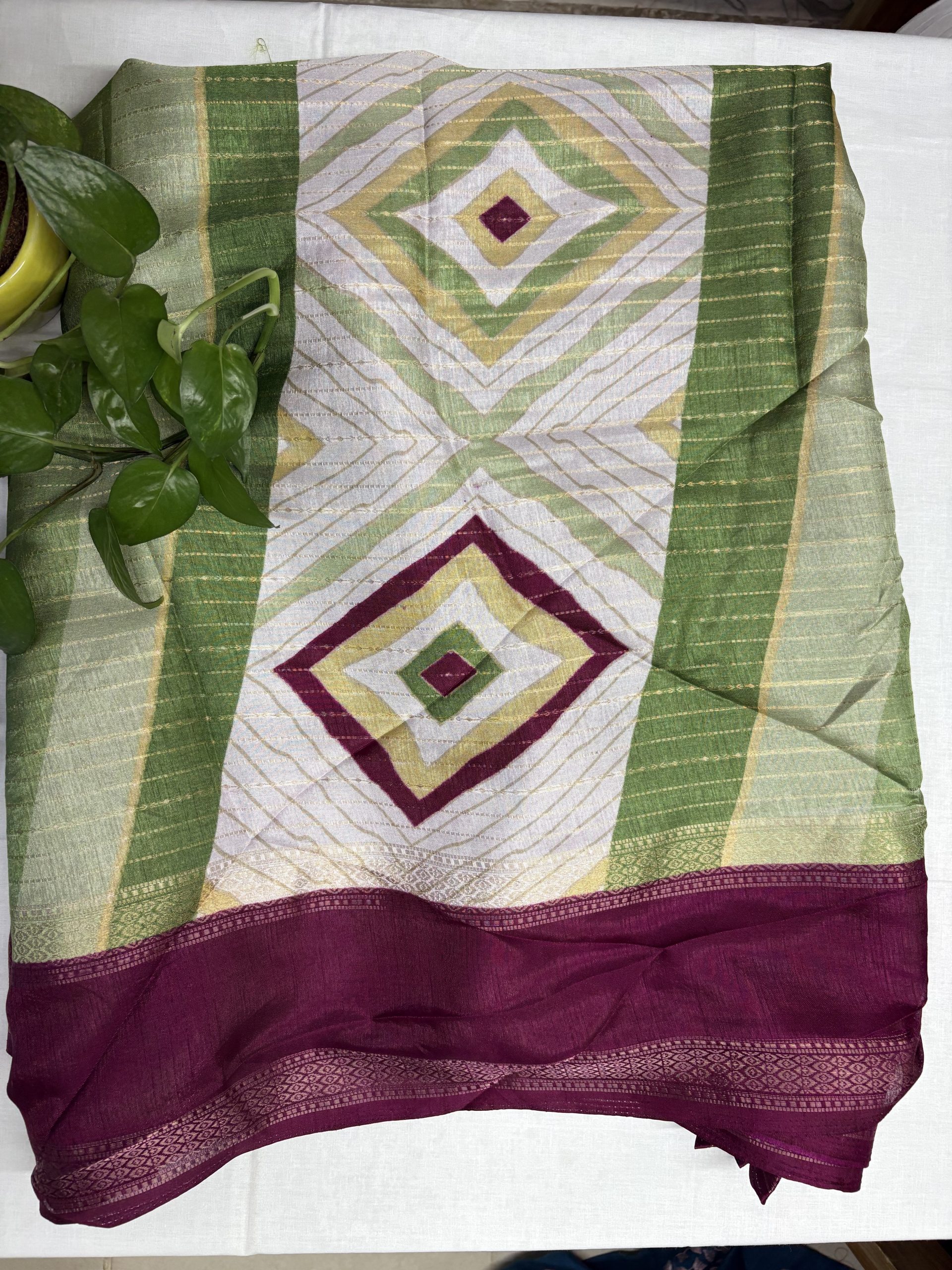 ivory, green and magenta saree
