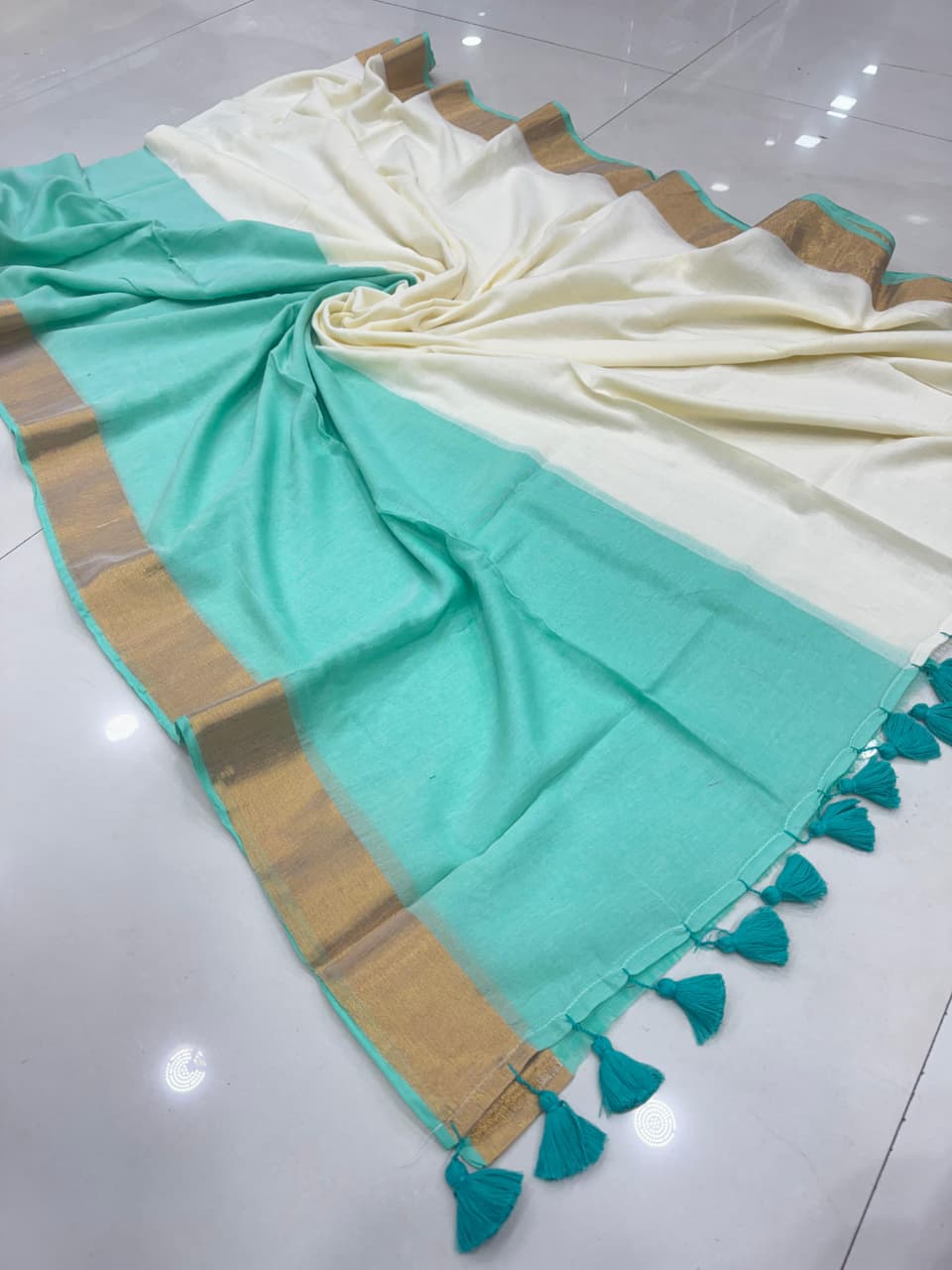 aqua green mul mul saree
